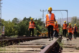 High school students are seen inspecting rails close to a historic train station, Erzincan, eastern Türkiye, Sept. 22, 2025. (AA Photo)
