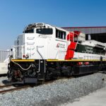 An Etihad Rail locomotive stands on the track at a rail facility in the United Arab Emirates. (Photo via etihadrail.ae)