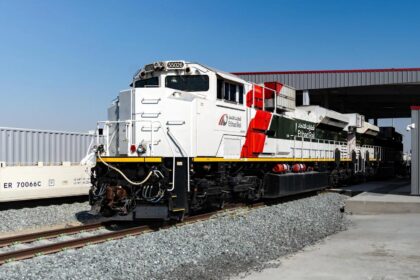 An Etihad Rail locomotive stands on the track at a rail facility in the United Arab Emirates. (Photo via etihadrail.ae)