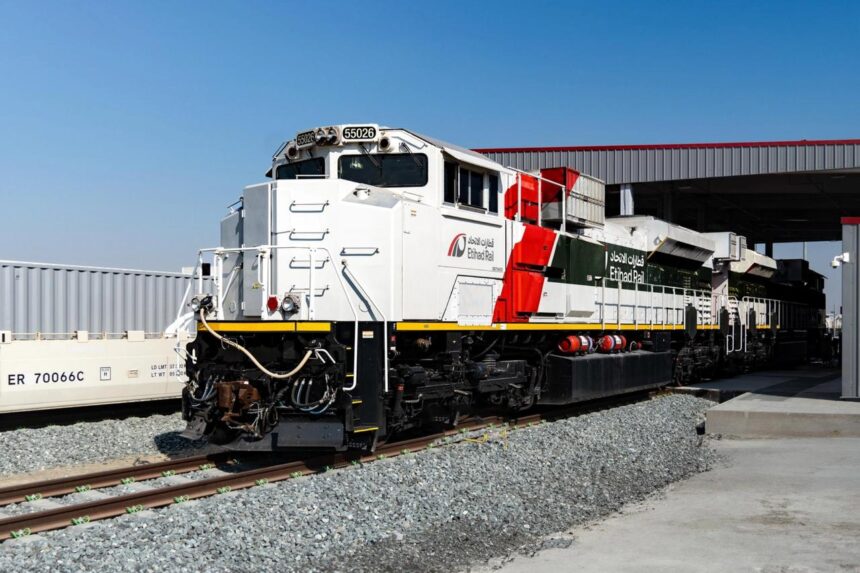 An Etihad Rail locomotive stands on the track at a rail facility in the United Arab Emirates. (Photo via etihadrail.ae)